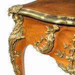 An outstanding Louis XV-style mahogany bureau plat after a model by Jacques B. Dubois, from the estate of Phyllis McGuire,