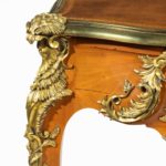 Details of a Louis XV-style mahogany bureau plat after a model by Jacques B. Dubois, from the estate of Phyllis McGuire