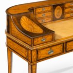 A Victorian freestanding satinwood Carlton House desk
