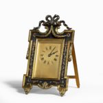 A bronze easel clock by Martin Company