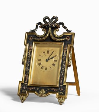 A bronze easel clock by Martin Company