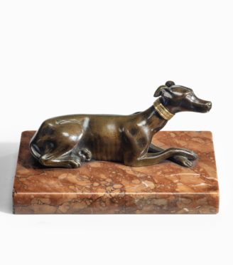 A charming Regency greyhound paperweight