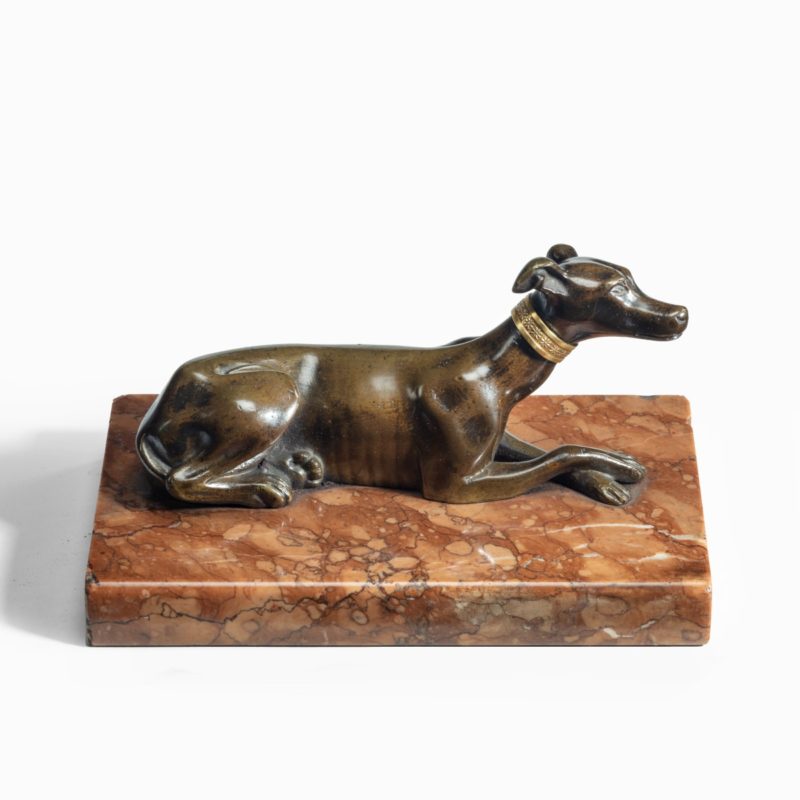 A charming Regency greyhound paperweight