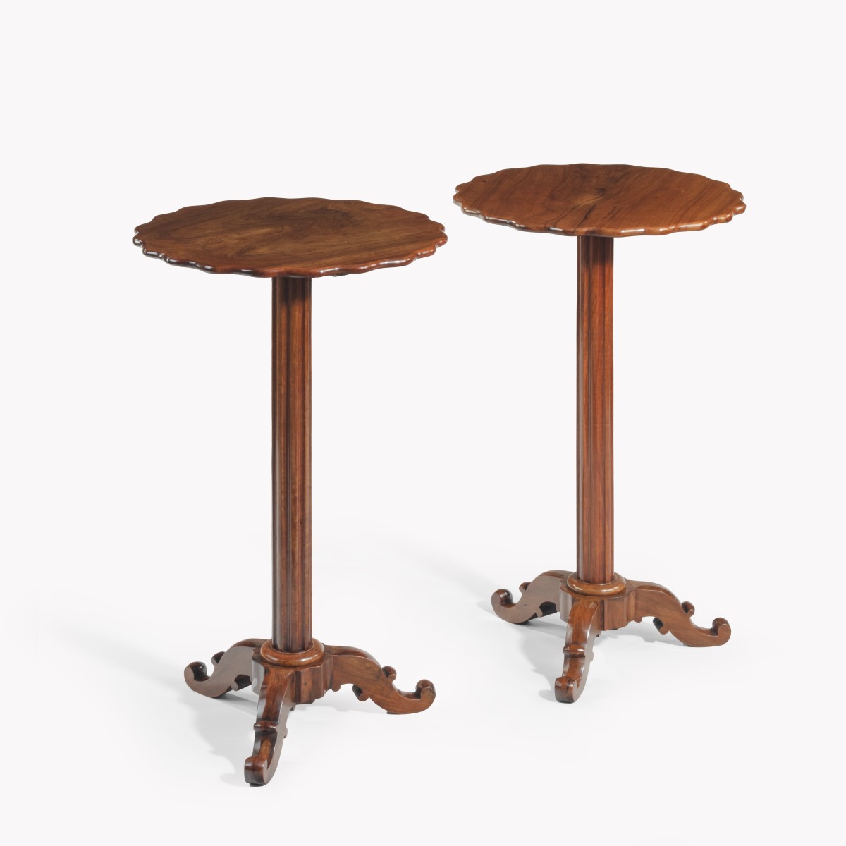 A pair of Italian solid olive wood side tables