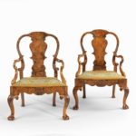 Pair of George II style walnut open arm chairs, possibly by Charles Tozer