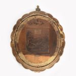 A Victorian gilt mirror back