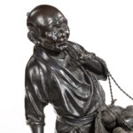 A Meiji period bronze of a vegetable seller details