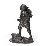 A Meiji period bronze of a boy carrying twigs