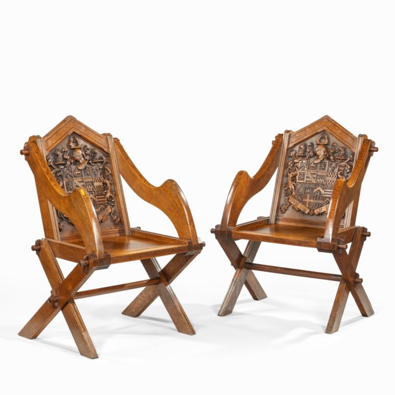 A pair of Glastonbury chairs made for the Pembertons of Durham