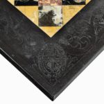 A rare and unusual Order of the Garter black marble table top details