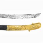 A fine presentation sword given to Lieutenant Charles Peake as a token of gratitude details of the blade