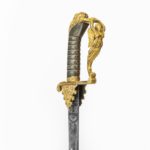 A fine presentation sword given to Lieutenant Charles Peake as a token of gratitude details of the handle