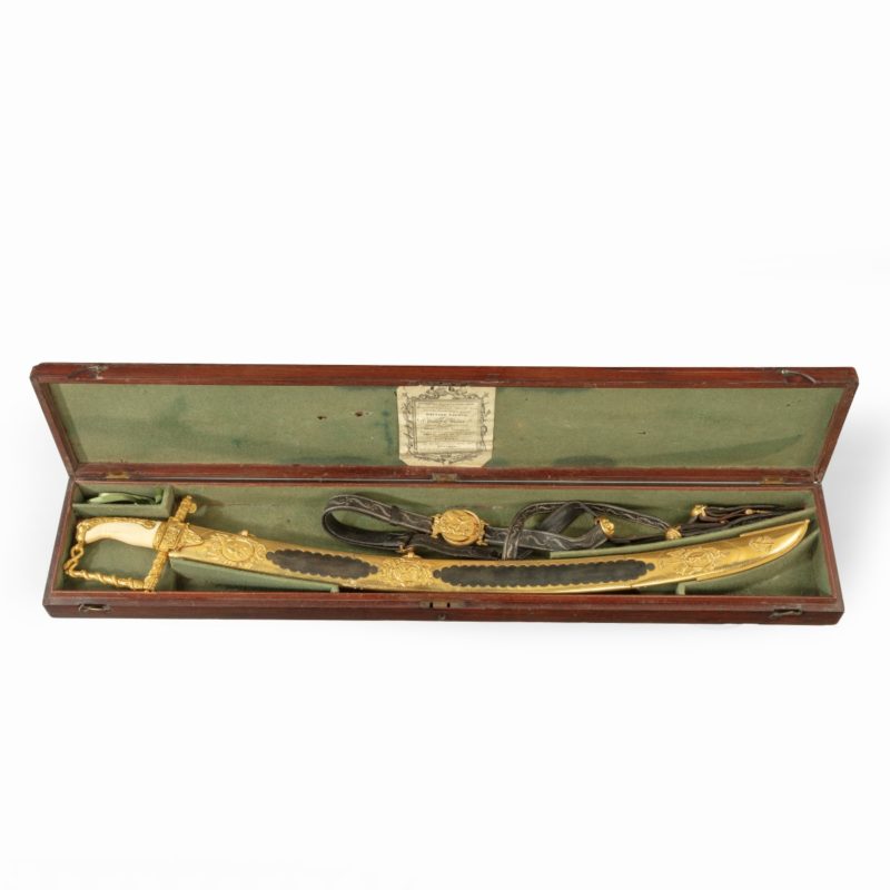 A £50 Lloyds Patriotic Fund Sword awarded to Lieutenant Charles Adams of HMS Renommee For His Part in the Capture of the Spanish Schooner Giganta - Cased