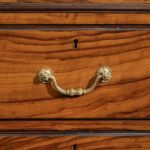 An olivewood pedestal desk attributed to Wright and Mansfield handle