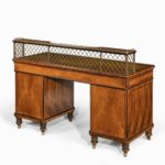 An olivewood pedestal desk attributed to Wright and Mansfield back