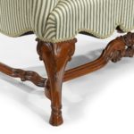 A pair of walnut window settees - Leg details