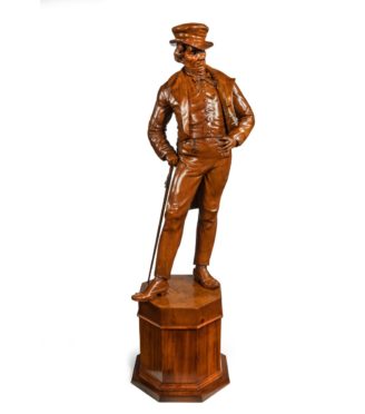 A Victorian carved walnut figure of a fashionable gentleman main image