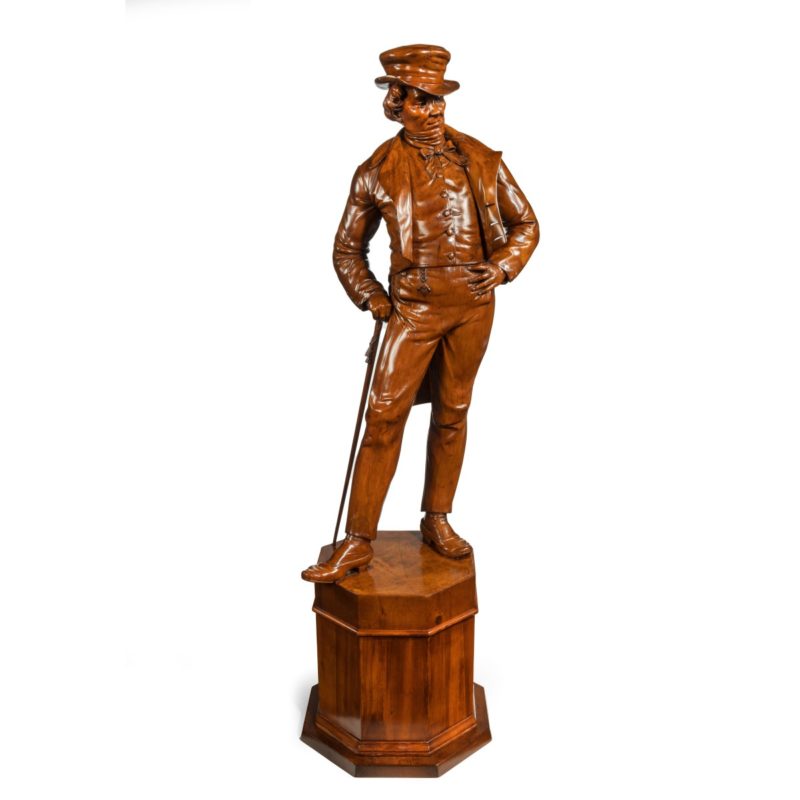 A Victorian carved walnut figure of a fashionable gentleman main image