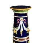 A pair of Victorian majolica jardinière stands by Minton top