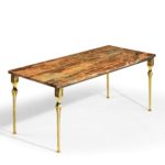 A brass marble-topped coffee table