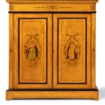 A pair of mid Victorian satinwood bookcases, bases