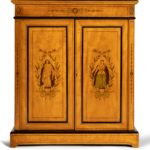 A pair of mid Victorian satinwood bookcases, base