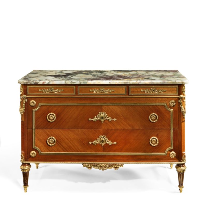 A French marble topped kingwood commode