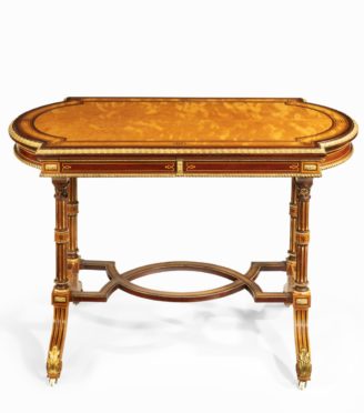 A Victorian fine satinwood ladies’ writing table attributed to Holland and Sons