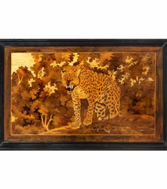 An Art Deco marquetry panel of a jaguar