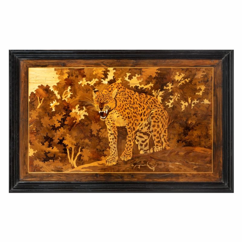 An Art Deco marquetry panel of a jaguar