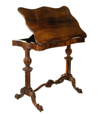 An early Victorian rosewood reading table