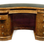 A Victorian kidney shaped desk in richly figured burr walnut, attributed to Gillows open
