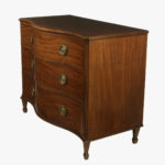 A George III mahogany serpentine chest of drawers corner details