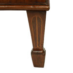 A George III mahogany serpentine chest of drawers leg