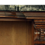 An extensive William IV Goncalo Alves breakfront open book case, the green marble top set above five open sections,