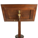 A large mahogany lectern details underneath