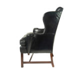 A generous George III wing arm chair side