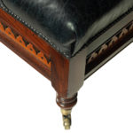 A large Victorian leather stool corner