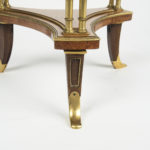 A pair of Louis XVI style mahogany and ormolu gueridons base leg