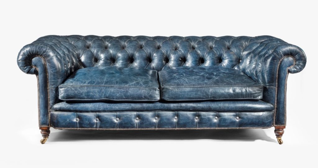 A Victorian 2-seater leather Chesterfield sofa