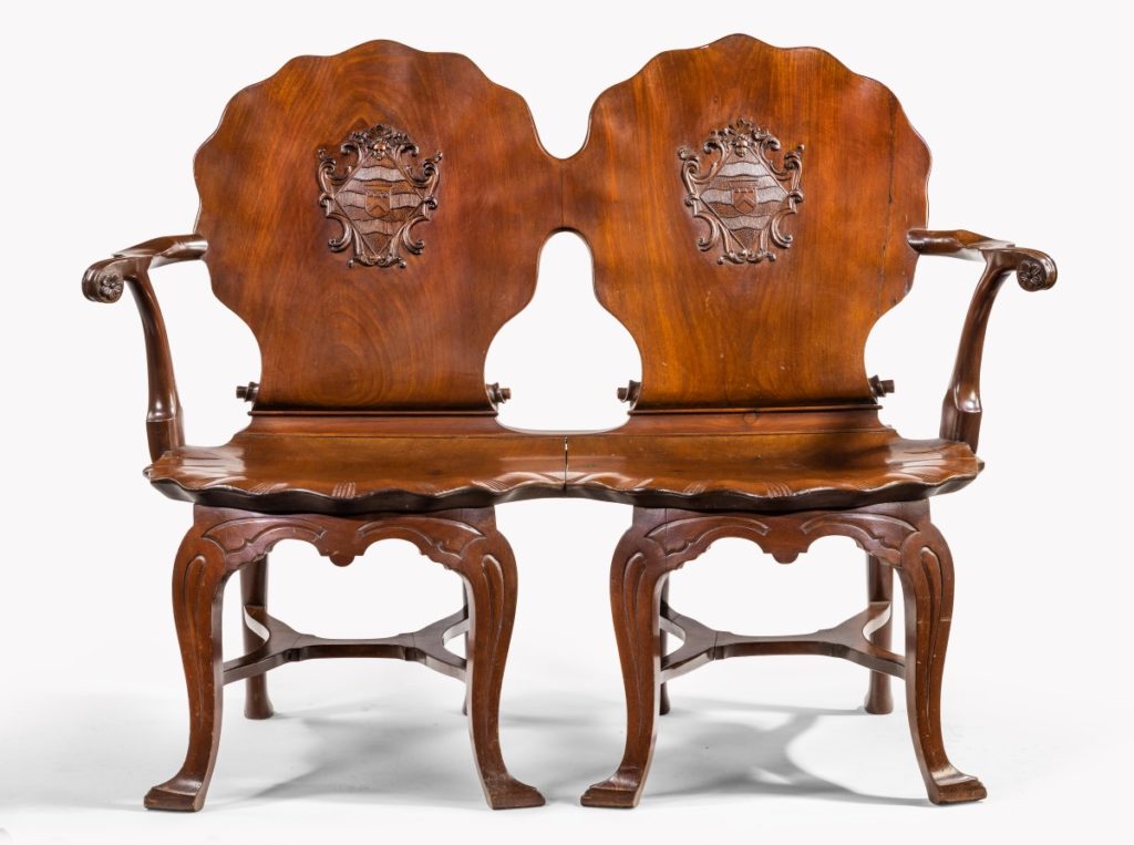 An exceptional late George II mahogany settee, made for Anne Basset, daughter of Edmund Prideaux, 5th Baronet of Netherton, attributed to William Hallett