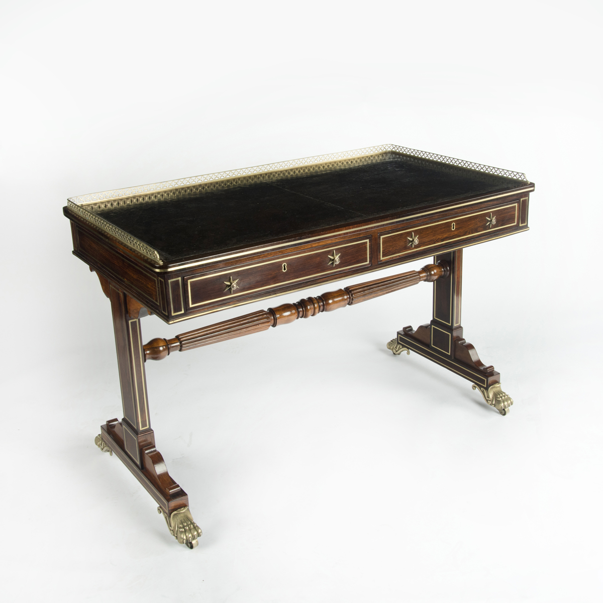 A Regency rosewood free standing end support writing table, by Gillows,