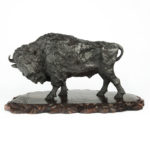 A large and impressive Meiji period bronze bison by Sano Takachika for the Kakuha Company
