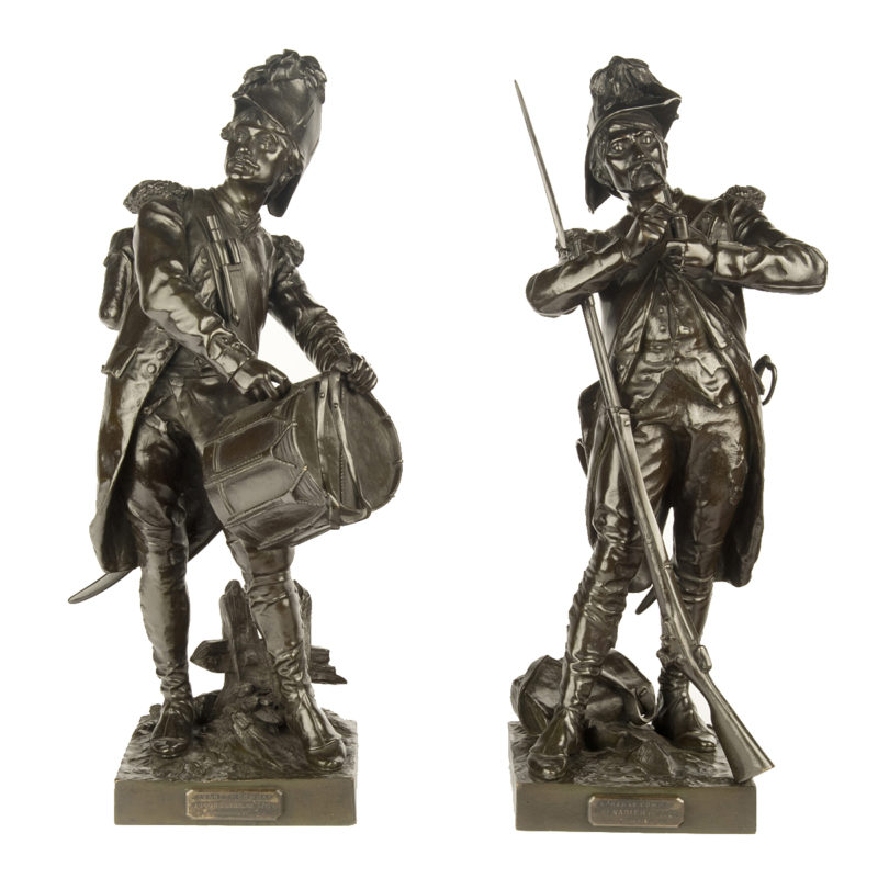 A pair of bronze figures entitled 'Avant le combat' and 'Après le combat' cast from models by Etienne-Henri Dumaige