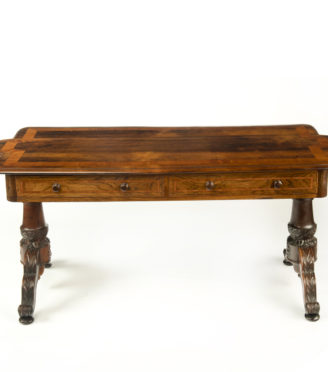 An Anglo Indian rosewood end support library table