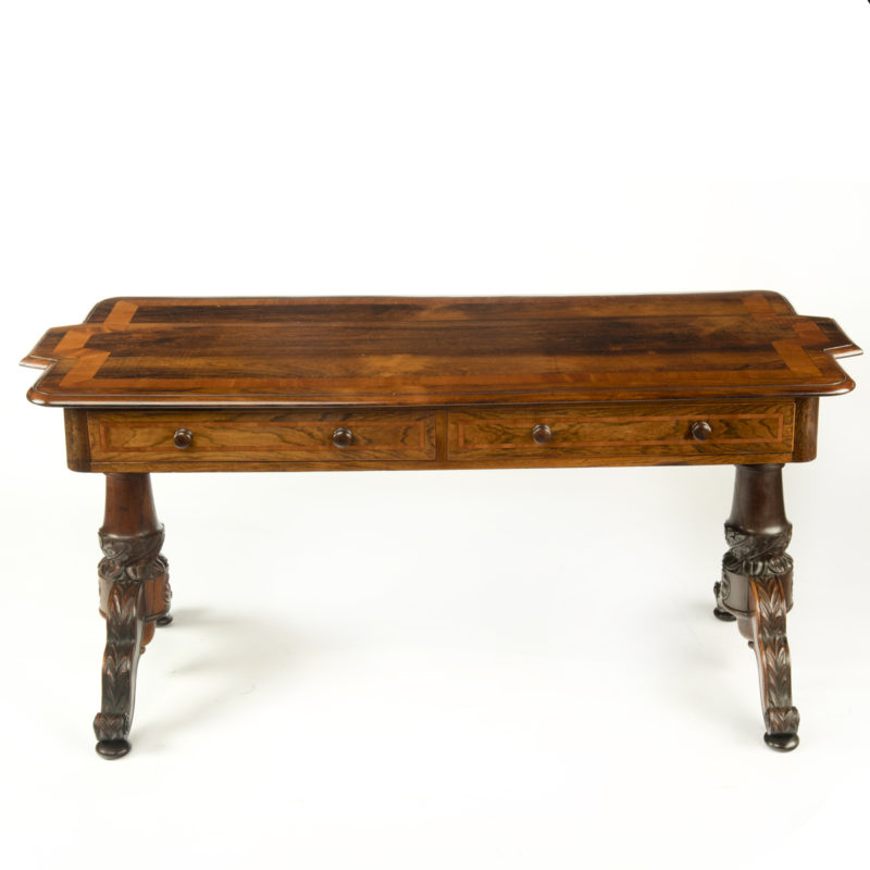 An Anglo Indian rosewood end support library table