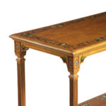 A mid-Victorian free-standing painted satinwood two-tier table details