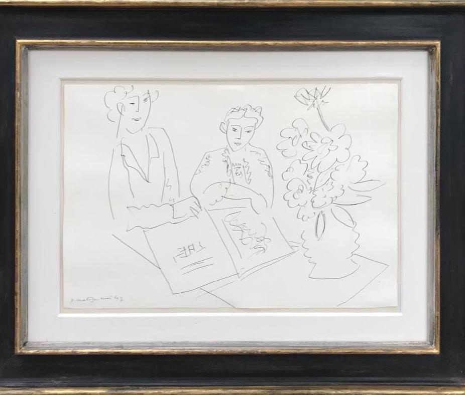 A Henri Matisse ink drawing of two women and a vase of flowers framed