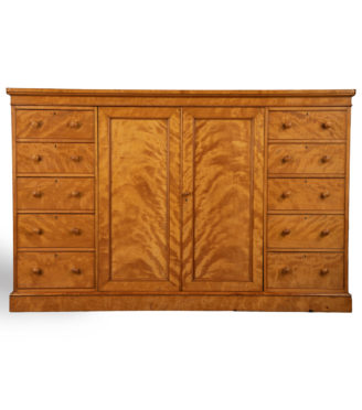 A West Indian satinwood gentleman’s compactum/press attributed to Holland & Sons