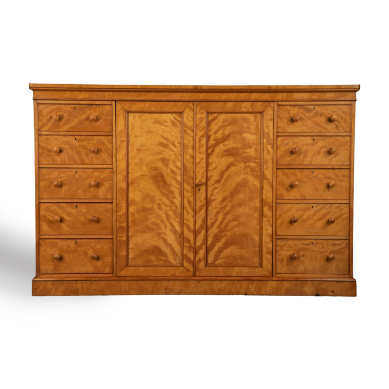A West Indian satinwood gentleman’s compactum/press attributed to Holland & Sons